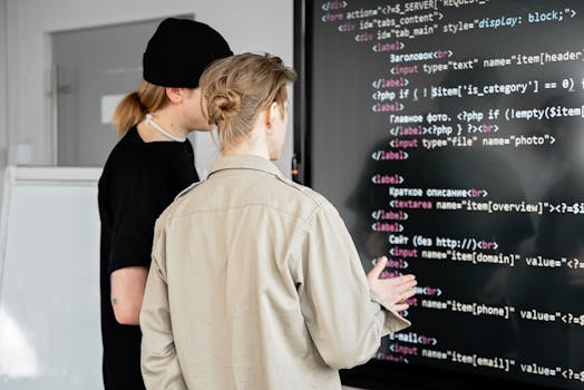 Programadores colaborando na criação de tutoriais.